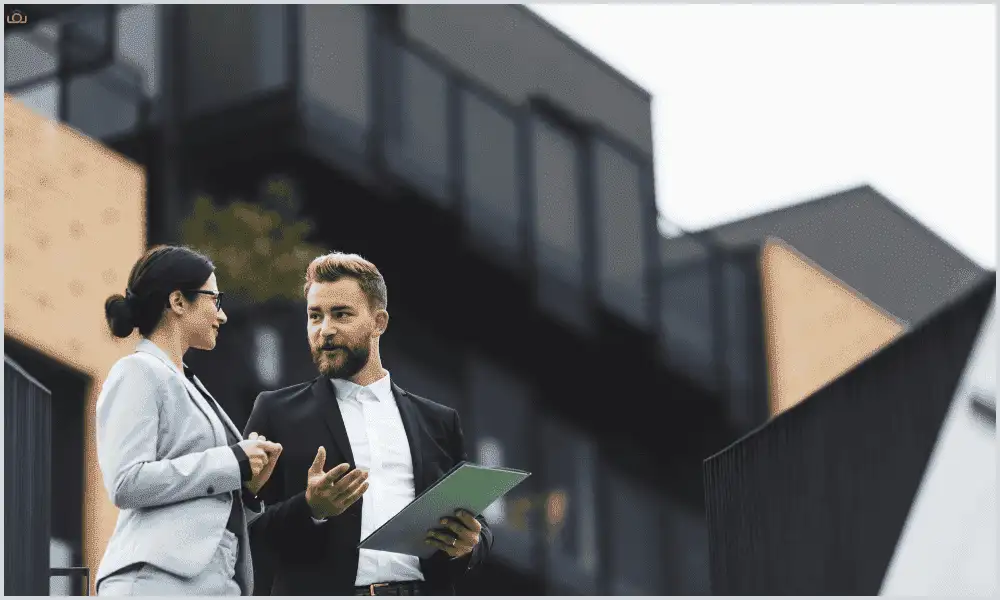 Real estate agent discussing transaction details with a virtual transaction coordinator during a video call