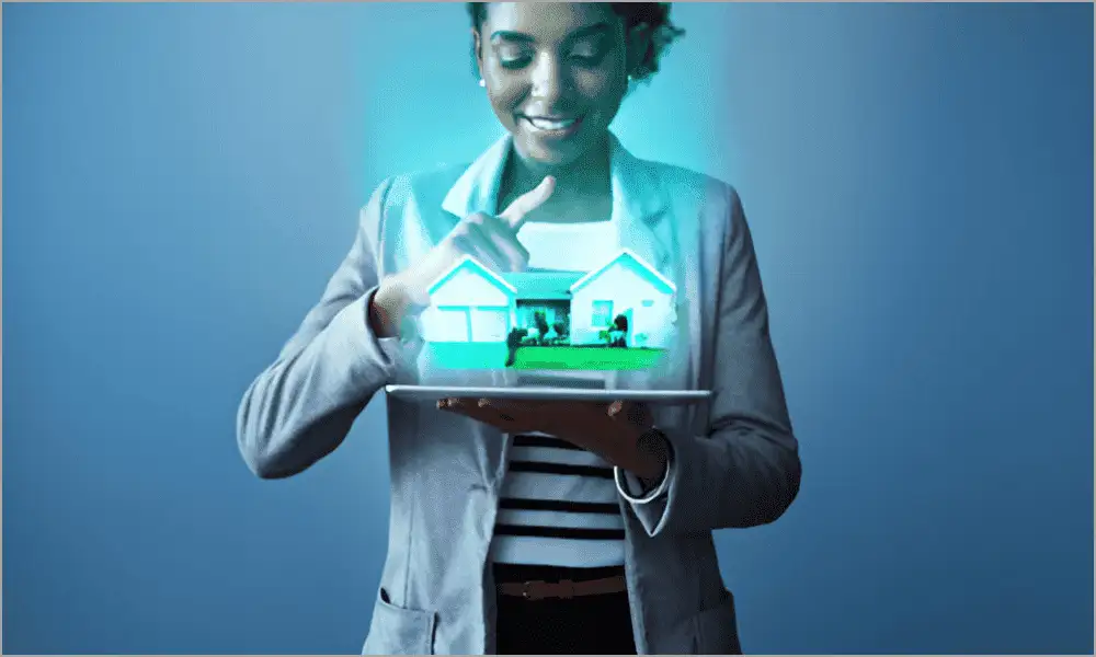 Young professional woman holding a laptop and viewing real estate images enhanced by AI technology