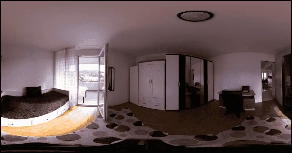 Low contrast shot of a 360-degree stitched interior photo with black tones and minimal contrast.