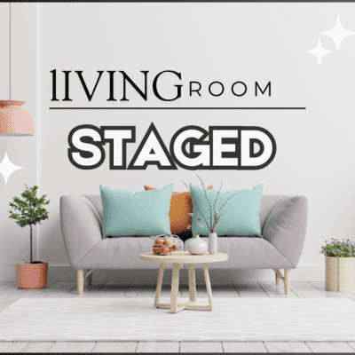 A beautifully staged living room with elegant furniture, a stylish coffee table, and a decorative flowerpot, showcasing the perfect example of living room staging.