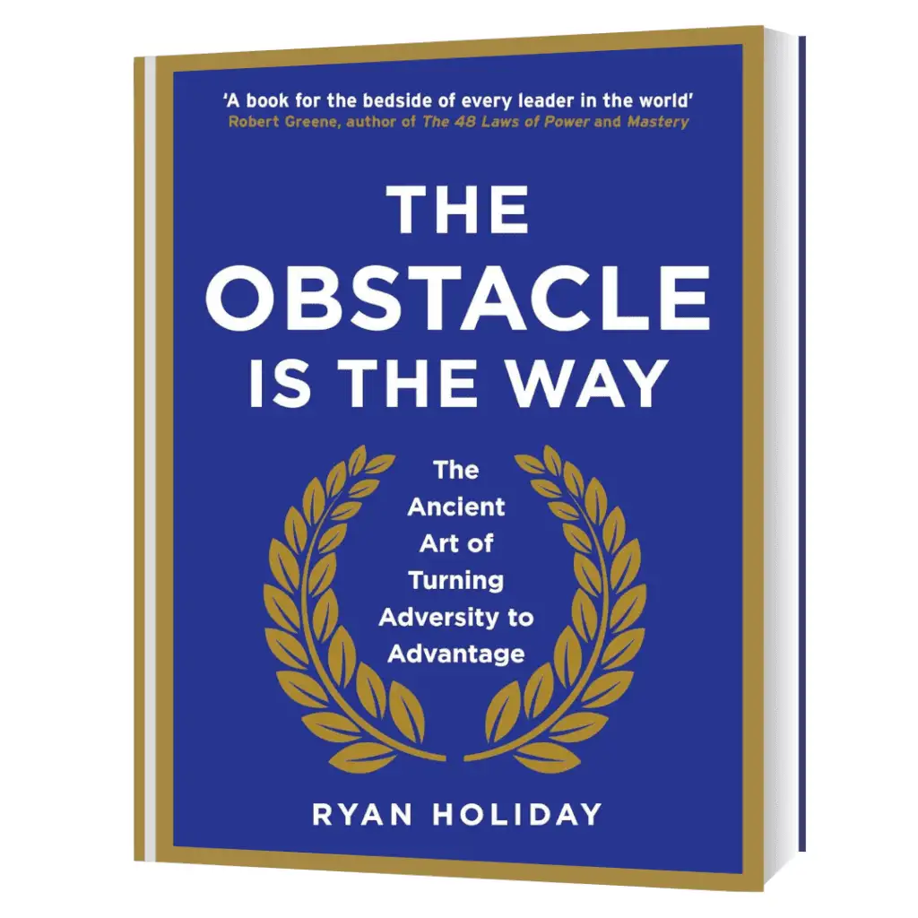 Cover of "The Obstacle Is the Way" by Ryan Holiday, featuring a blue background with the title in bold white letters and a gold laurel wreath around the subtitle.
