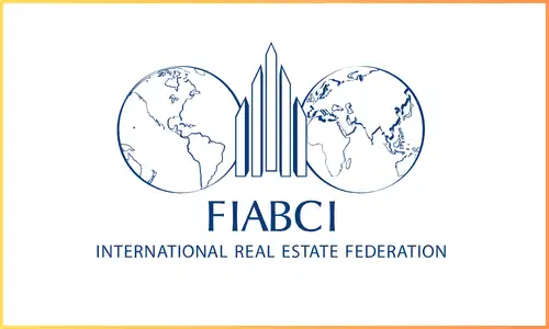 Logo of the International Real Estate Federation (FIABCI) with the text "FIABCI" and "International Real Estate Federation" flanked by two world maps and building icons.
