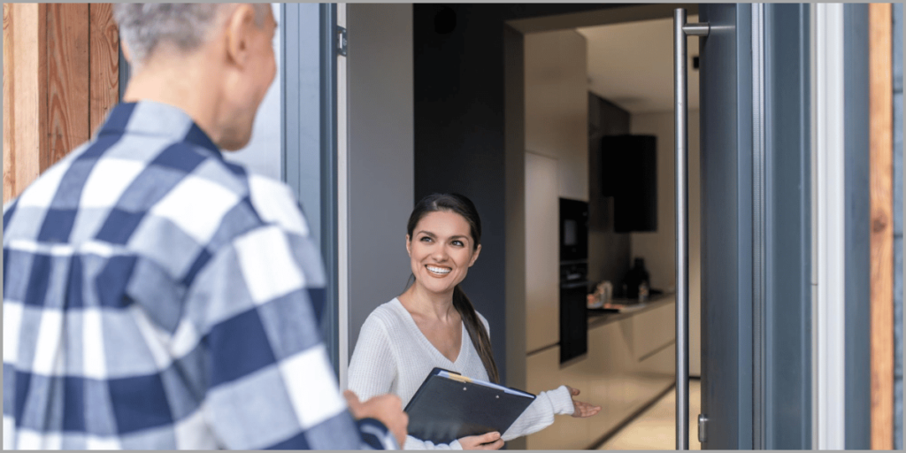 Real estate agent welcoming visitor and encouraging sign-up with open house scripts.