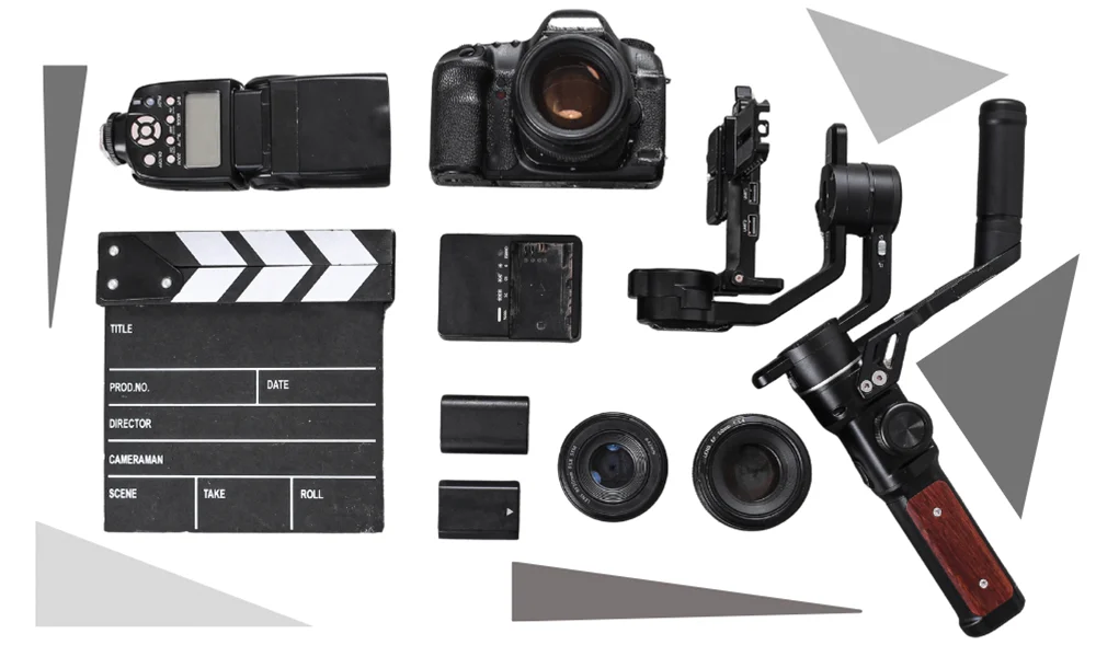 Essential gear layout for choosing and using a camera gimbal: DSLR camera, lenses, batteries, flash, clapperboard, and disassembled 3-axis handheld gimbal – perfect for learning how to use a gimbal.