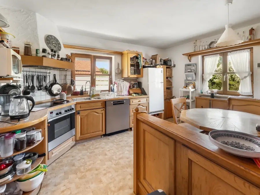 Kitchen before clutter removal and photo retouching