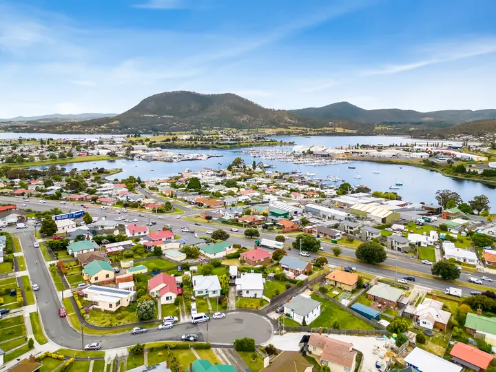 Aerial real estate drone photo editing thumbnail showing clearer property location context