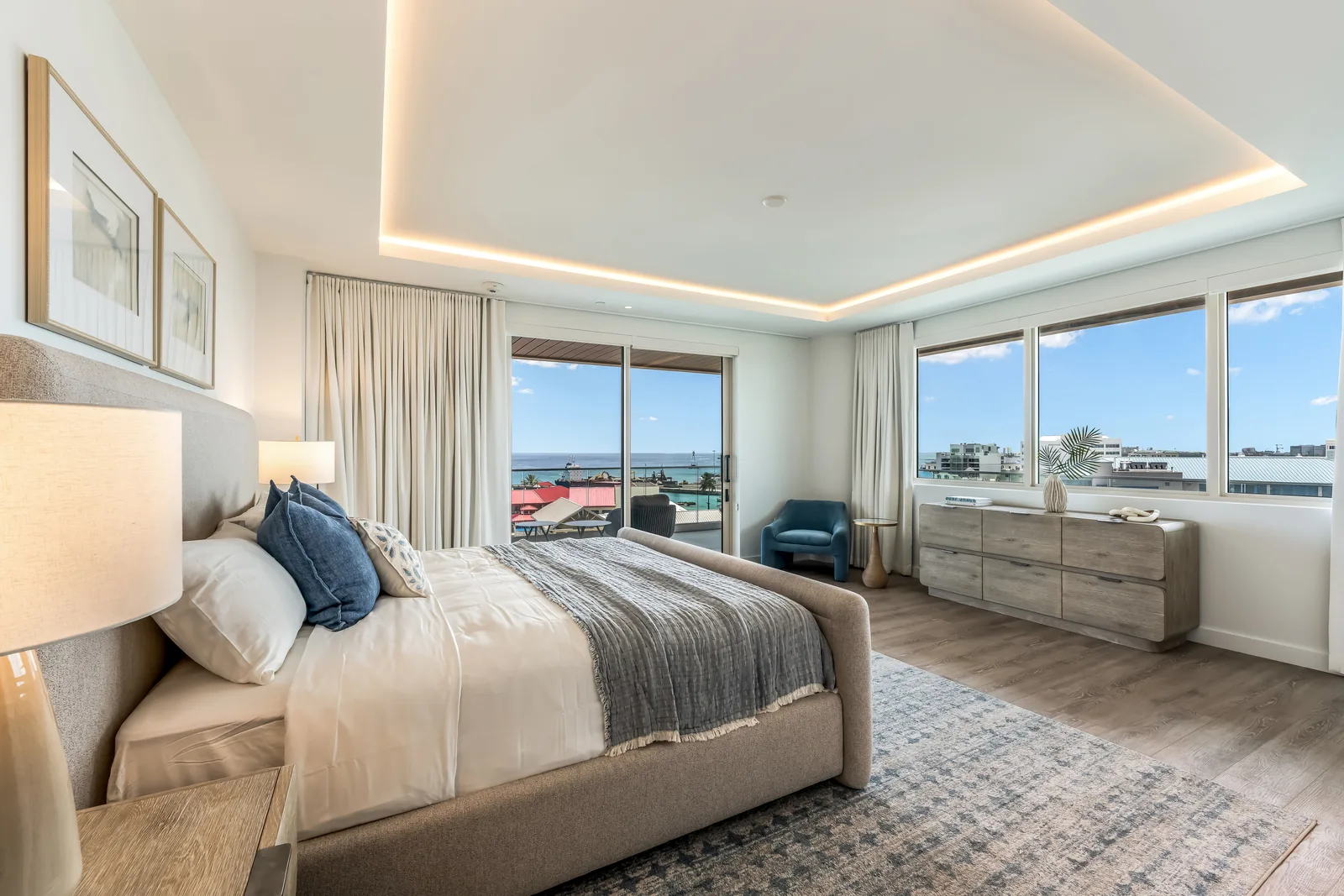 Real estate bedroom after HDR photo editing with balanced window detail by PixelShouters