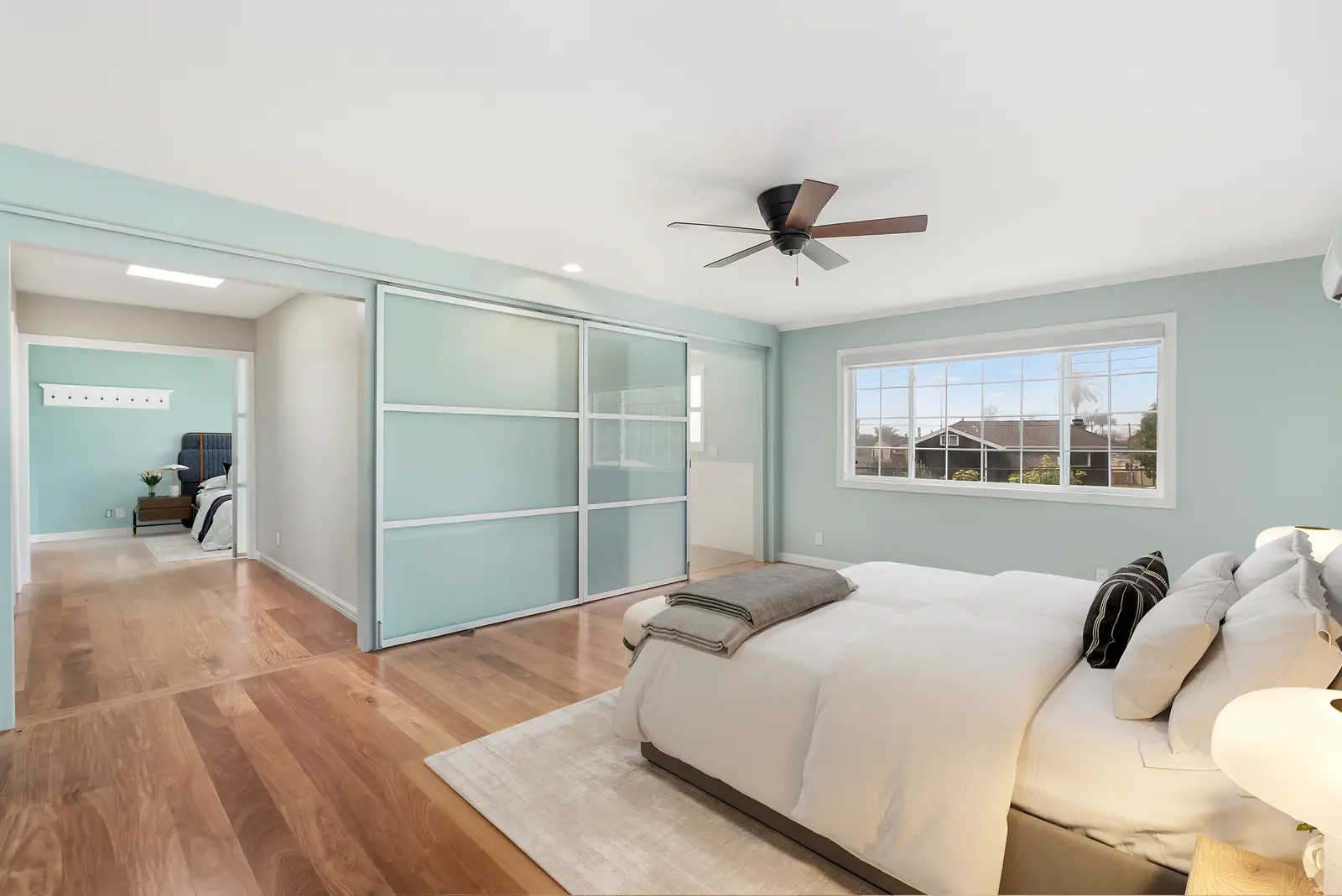 Clean bedroom after real estate object removal and natural retouching by PixelShouters