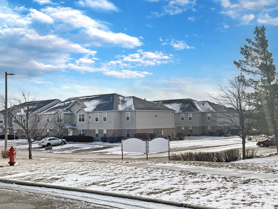 Winter real estate exterior before snow removal and lawn replacement by PixelShouters