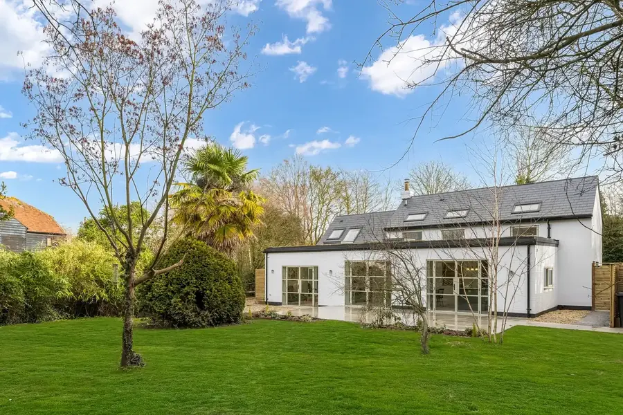 Exterior property after sky and lawn real estate photo enhancement by PixelShouters