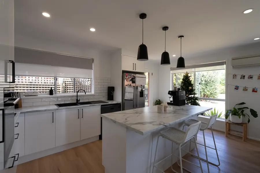 Kitchen before real estate photo enhancement by PixelShouters