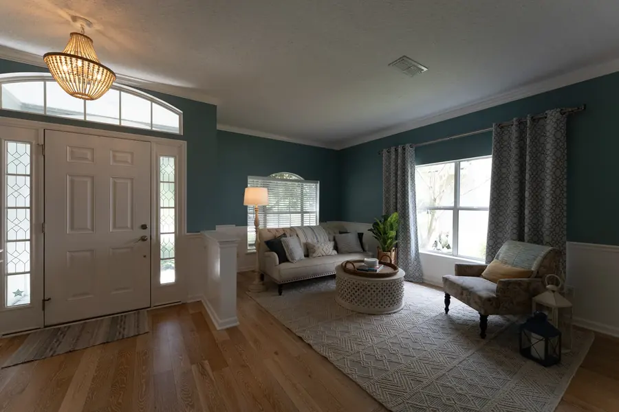 Living room before real estate photo enhancement by PixelShouters