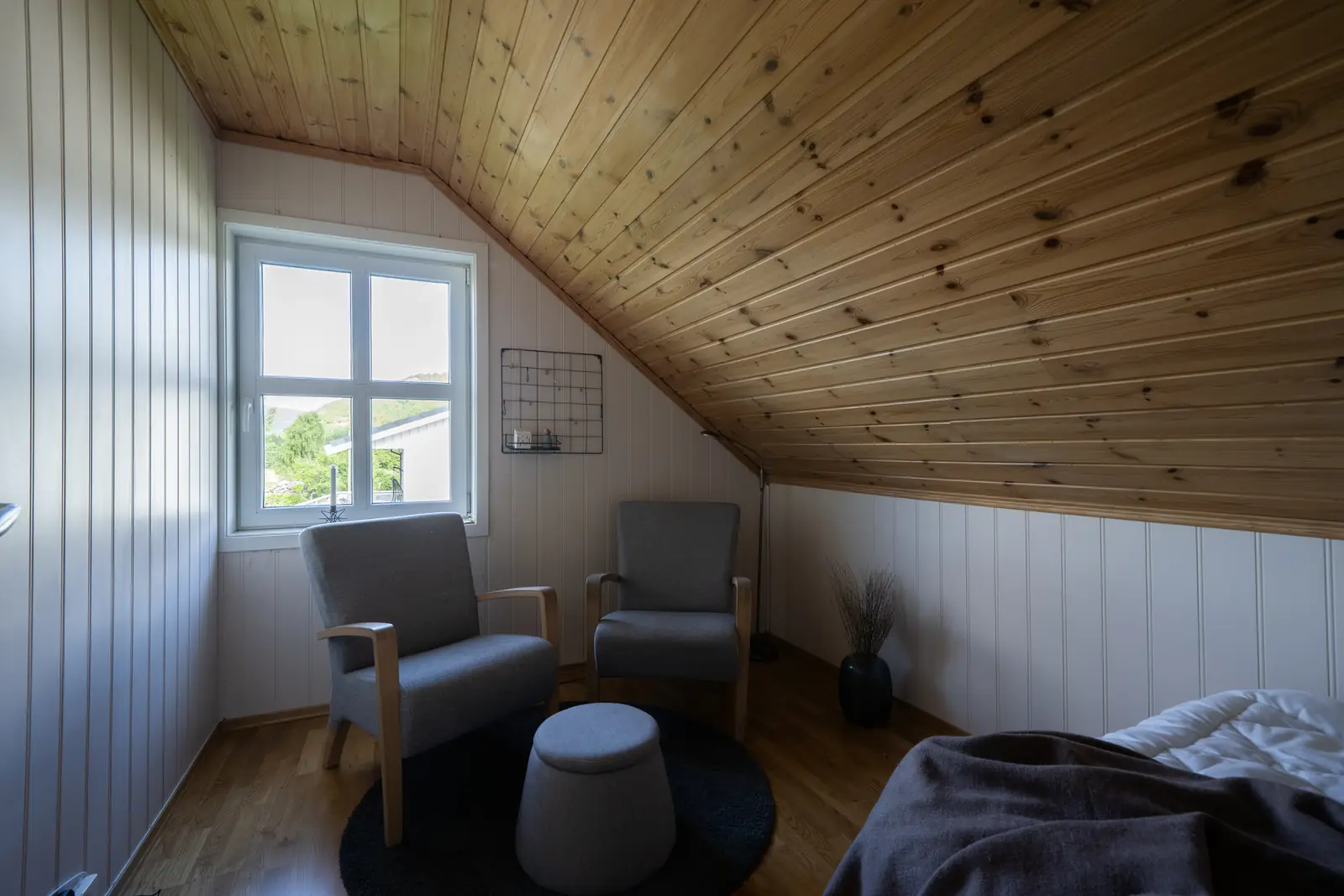 Attic bedroom before real estate photo enhancement by PixelShouters