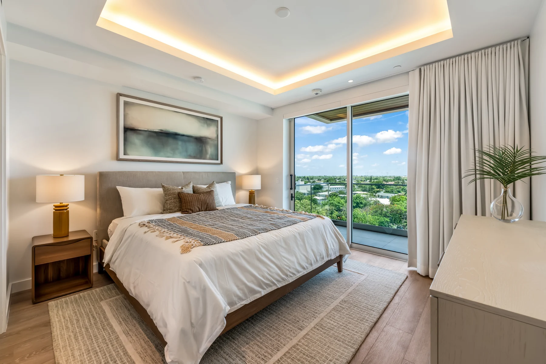 Luxury bedroom after real estate photo enhancement with balanced window detail by PixelShouters