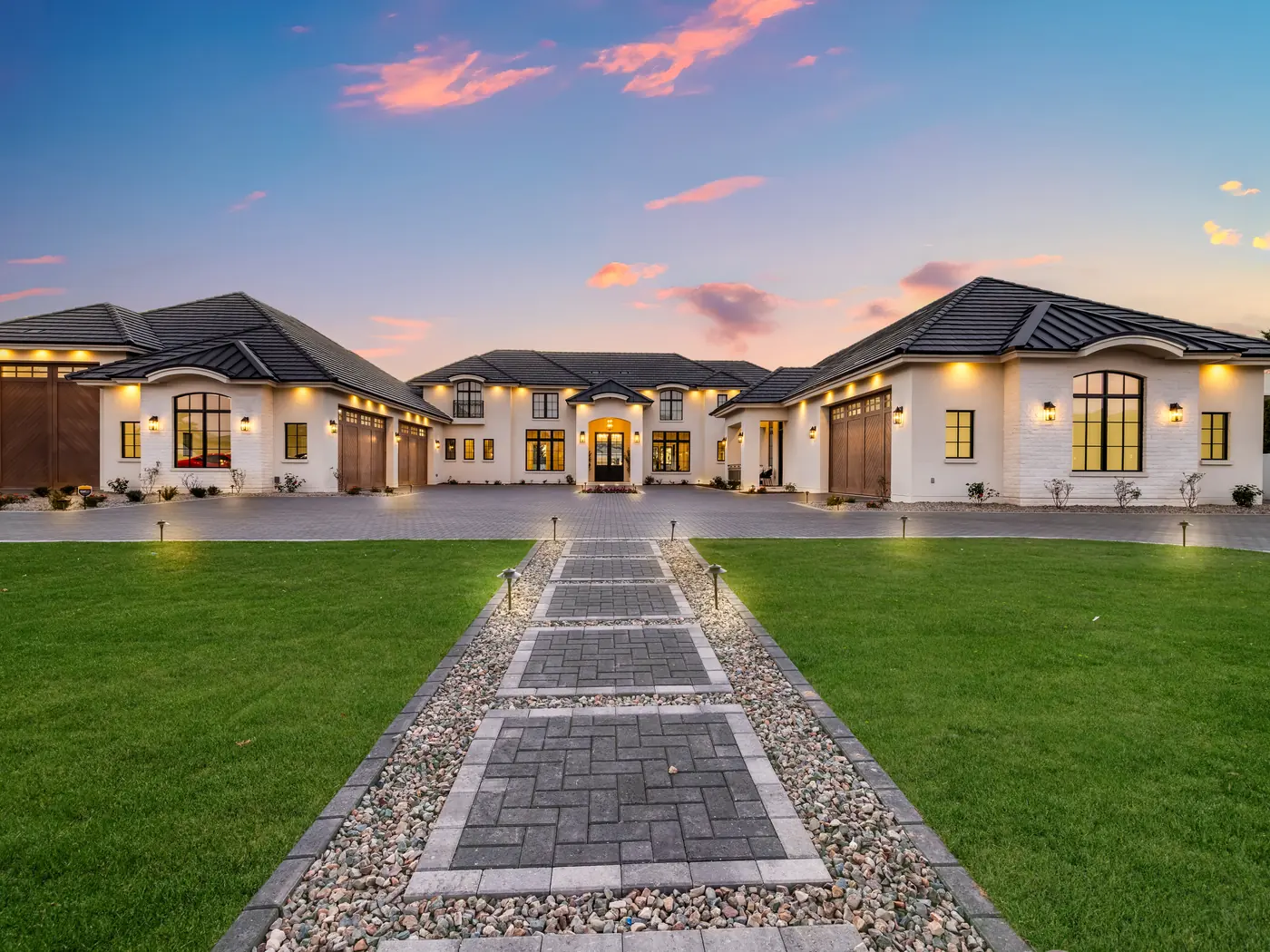 Luxury real estate exterior after day to dusk photo editing by PixelShouters